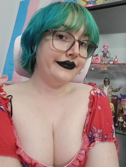 Revy with blue hair
Soft squishy face and round.
Wearing glasses and black lipstick.
Wearing a cute red top.
Her borbs be huge here