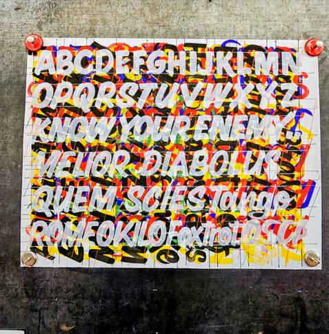 Photograoh of a design lying on one of the drawing boards at  obl Signs museum in Brooklyn.