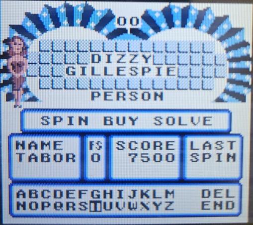 Wheel of Fortune puzzle for the Gameboy Advance spelling out "Dizzy Gillespie" that I failed to solve on my own.