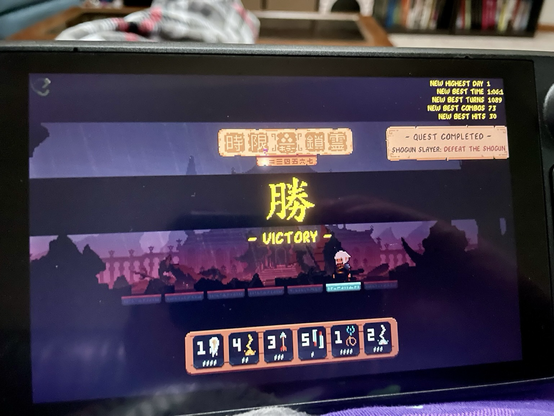 This screenshot was taken when beating the game. “VICTORY” is displayed, as well as an unlocked achievement that says, “Quest completed — Shogun Slayer: Defeat the Shogun”  It also displays the run stats:  “New highest day: 1 New best time: 1:06.1 New best turns: 1089 New best combo: 73 New best hits: 30”