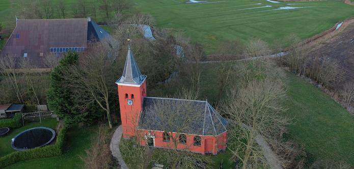 De Mariakerk van Boer in het (aan de zee onttrokken) weidse landschap