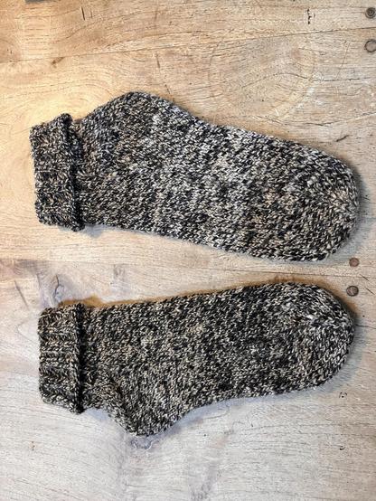 2 socks in beige/darkbrown. I folded the cuffs