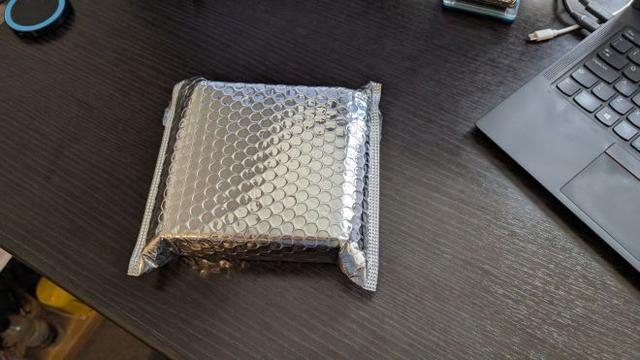 A square silvered bubble wrap envelope