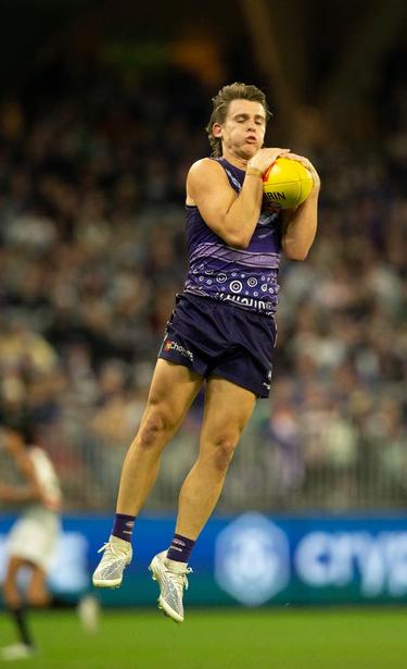 Caleb Serong takes a mark (catch) for Fremantle. Credit: Dave Woodley for AFANA.