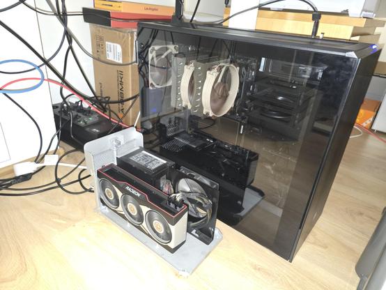 Desktop with a careless external GPU connected to it.