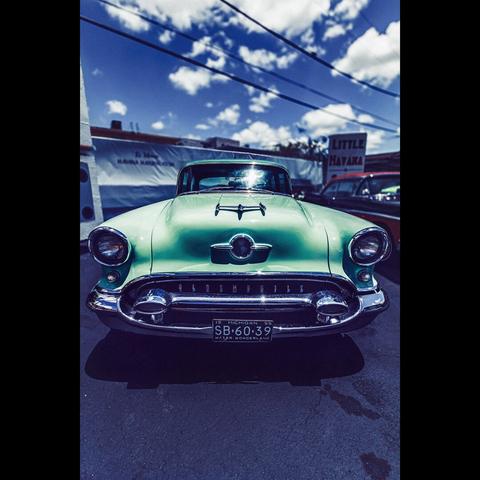 Photo in color of an old american car , Miami, Little Havana district, USA
