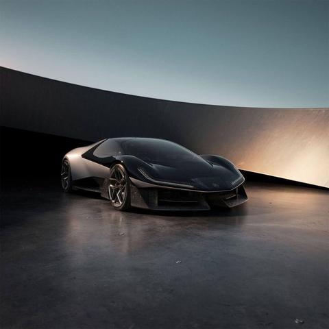 Sleek black sports car with sharp headlights in a modern, curved concrete setting under a clear sky.