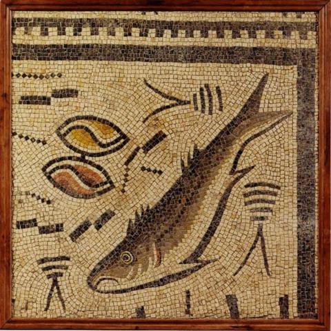 This fragment of the third century Roman mosaic is from Nigrán, a village in the south of Galicia. It depicts a fish, two clams, and some remains that look like fish skeletons. Photo credit: GALERÍA CARLTON HOBBS.