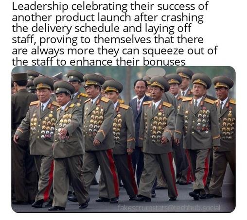 A group of overly medal-adorned North Korean generals waking ij a group.

Caption: Leadership celebrating their success of another product launch after crashing the delivery schedule and laying off staff, proving to themselves that there are always more they can squeeze out of the staff to enhance their bonuses