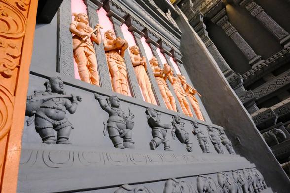 Dancing figures on the wall of a Hindu temple.