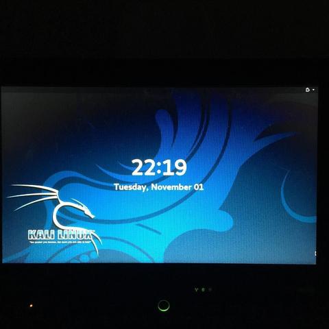 This picture shows a computer screen displaying a wallpaper with a stylized dragon motif against a blue background. The time on the computer is 21:19, as indicated by the digital clock at the top of the image. There is text on the wallpaper that reads "Kalifornia," but it is not entirely clear what the context or significance of this word is within the image.