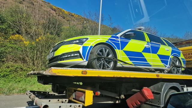 Cop car on a pick up