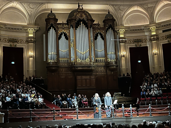 The artists in the concert hall