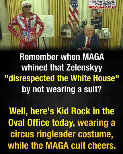 Trump sits at the desk in the Oval Office, looking like he just passed gas; while Kid Rock stands to the left wearing a red suit with white stars and flames(?) and a US-like-flag with 21 stripes and 13 stars over his groin.

Image tagged @Acyn | MTN

Text below reads:
Remember when MAGA whined that Zelenskyy "disrespected the White House" by not wearing a suit?

Well. here's Kid Rock in the Oval Office today, wearing a circus ringleader costume, while the MAGA cult cheers.