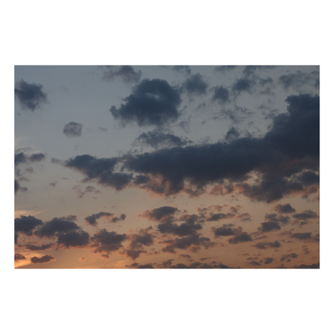 colorful wisps of clouds at sunset