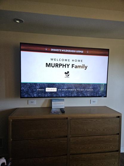 TV in hotel room saying Welcome Home Murphy Family