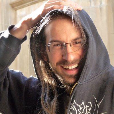 Photograph of a smiling researcher