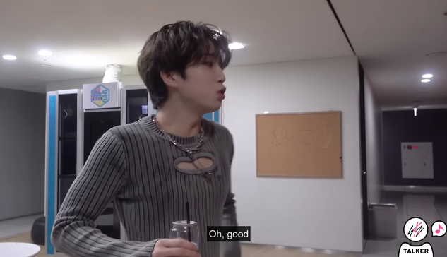 Han backstage at a music show, looking off screen (at Felix, who has just smacked his bum while walking past). Caption: Oh, good