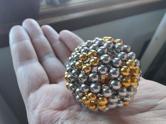 The complete truncated icosahedron - the same shape as a traditional football, or a C60 molecule, but made of spherical magnets. It is pictured here in the palm of my hand.