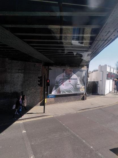 An ad about the value difference between bloodstains from football injuries and menstrual blood, shown on a woman footballers white shirt. Bravery/ahame