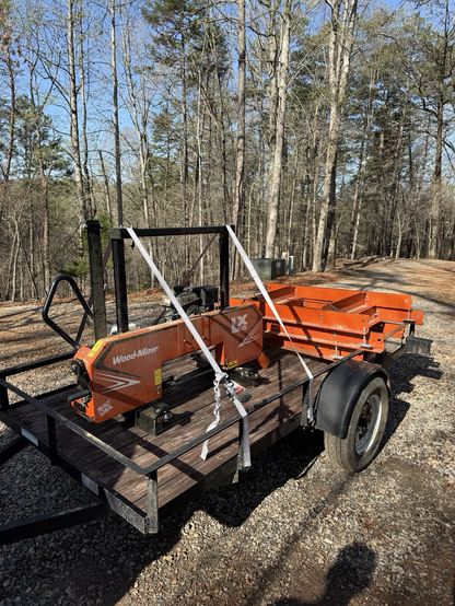 A Woodmizer sawmill on a trailer ready to transport