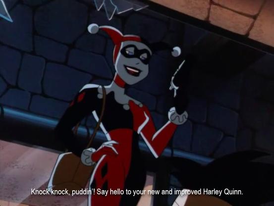 A woman dressed as a harlequin standing in the doorway of a prison cell that has been blown open. She's saying, “Knock knock, puddin!’ Say hello to your new and improved Harley Quinn."