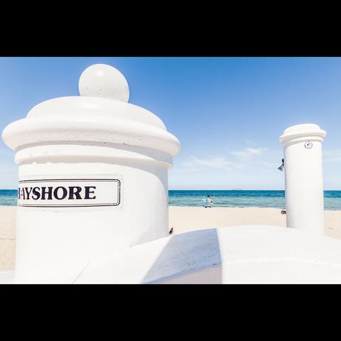A lonely man sit on the Fort Lauderdale beach, Florida, USA