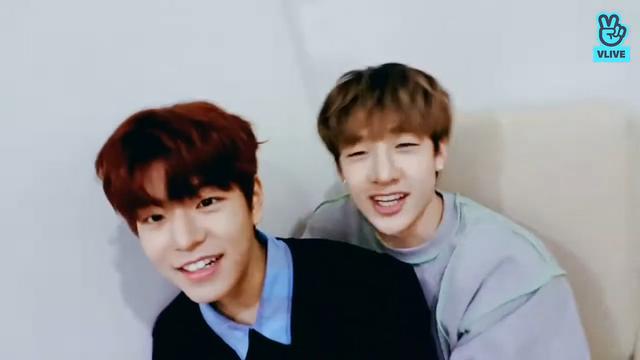 Bang Chan somehow ended up hugging Seungmin from behind even though he got shoved on top of him. Seungmin is happy about it.