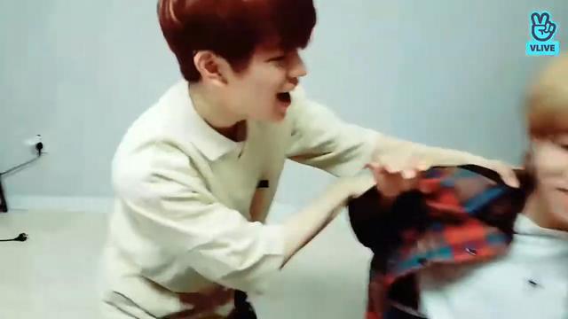 Seungmin shakes down Han in an attempt to get more snacks