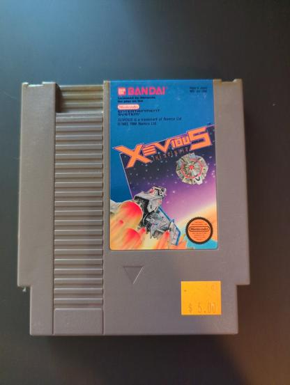 a xevious cartridge for the NES