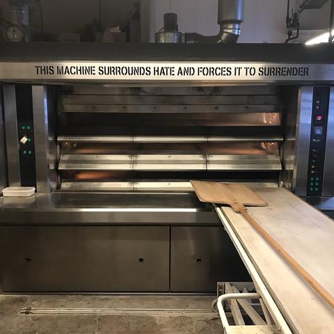 Steam injected deck oven with the woods “This machine surrounds hate and forces it to surrender.”