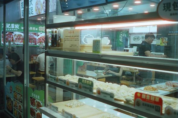 Dumpling restaurant with handmade dumplings at night.