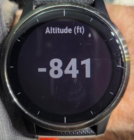 A black watch showing: Altitude(ft)    -841