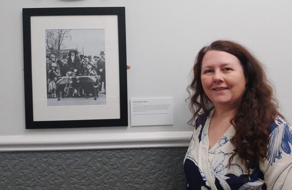 Cllr Janice Silvester-Hall with a picture of Daisy Stuart Shaw
