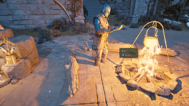 The Character Kai from the game Avowed. Standing in front of the Parties Campfire warming his hands standing with both feet beneath the ground thanks to an engine clipping issue.