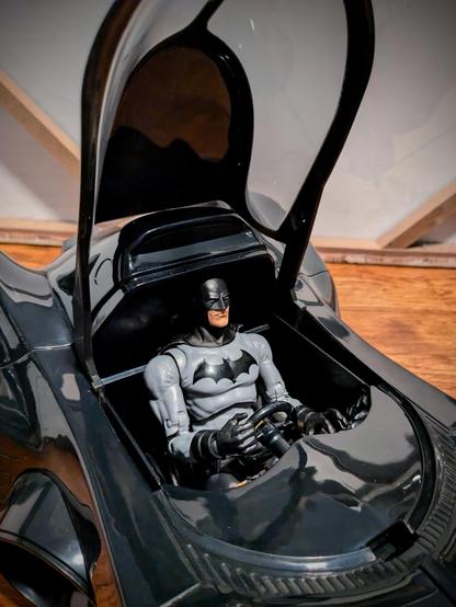 McFarlane Batman figure from Batman Reborn in the 1:10 scale 1989 movie Batmobile