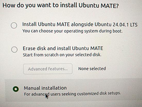 photo of installation screen from Ubuntu MATE 24.10 -- the three options are basically (1) install it as a dual-boot with the existing OS, (2) wipe the disk and use all of it for the install, and (3) manual -- which leads to the next screen in this post