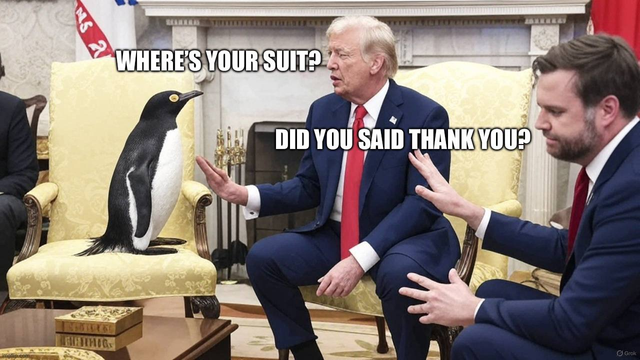 The image depicts a humorous scene with two men in suits seated in a formal setting, likely an office or a meeting room. The man on the left is wearing a blue suit with a red tie, while the man on the right is also in a blue suit with a red tie. Between them, on a yellow upholstered chair, is a penguin standing upright. The background features a fireplace and a flag, suggesting a formal or governmental environment.

Text overlays are present in the image, with the phrases "WHERE'S YOUR SUIT?" and "DID YOU SAID THANK YOU?" appearing above the penguin and the man on the right, respectively. The man on the right is gesturing with his hands, seemingly in conversation with the penguin. The overall tone of the image is humorous, with the penguin's presence adding an unexpected and whimsical element to the formal setting.