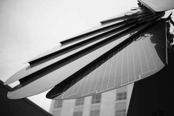 Monochrome photo of a retractable solar panel.