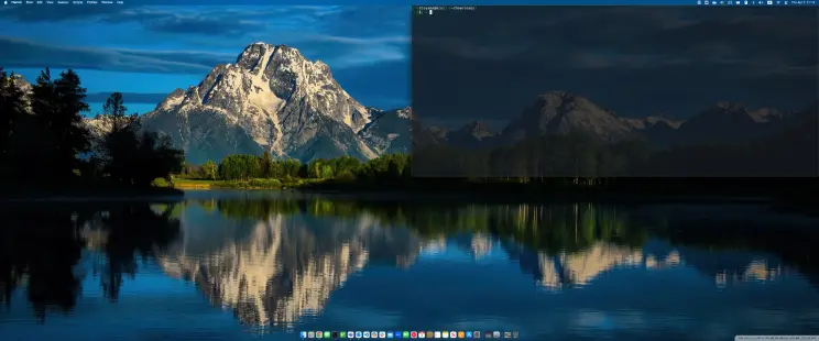 My macOS desktop with an iTerm2 terminal with no title bar open on the top right quarter of the screen. The terminal is shown with 20 per-cent transparency.