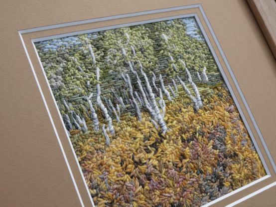 Same framed artwork in close up and angled to show texture and detail