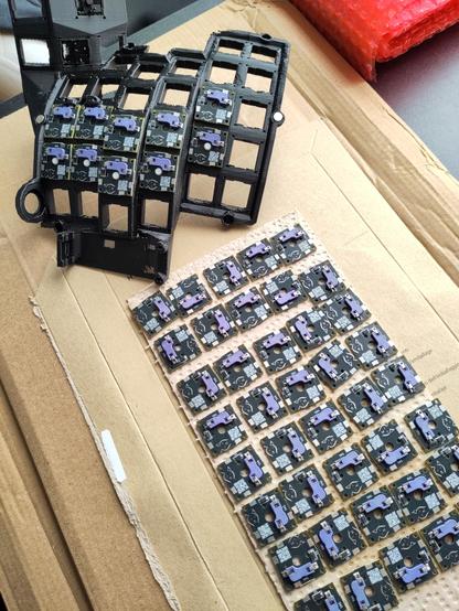 Started mounting my Snowshoe MX boards on the back of keys, to prepare for soldering.
