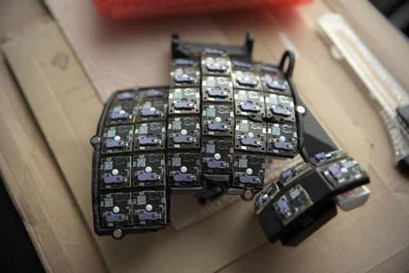 All of the keys on the right hand side now have their Snowshoe MX boards attached; now to start soldering wires between them!