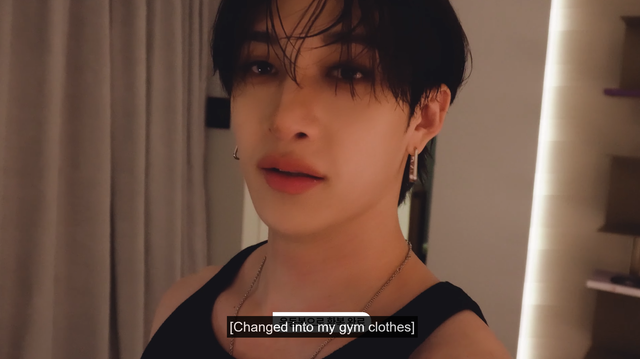 Bang Chan ready to go work out, still looking impossibly beautiful, but now in a slutty black tank top