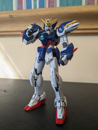 RG Wing Gundam EW without wings standing in a relaxed fighting pose