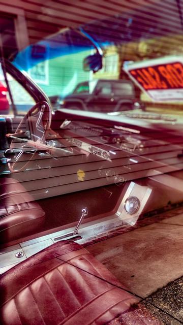 Interior photo of a 1962 Oldsmobile Starfire.