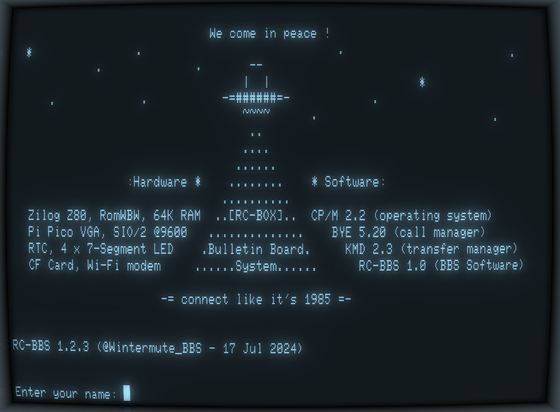 This screenshot features the ASCII Art welcome banner of RC-BOX BBS. The technical specs of the system are listed as well as an ASCII UFO which is sending a beam down to the specs listed. All in plain ASCII text.

If you want to visit, use a VT100 capable Telnet client and connect to:

rc2014.ddns.net:2014