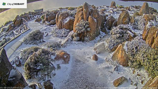 Mt Wellington summit overlooking the Derwent estuary at sunrise.