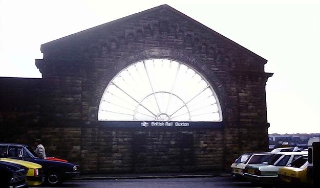 Fan window, with sign reading 'British Rail Buxton'.
