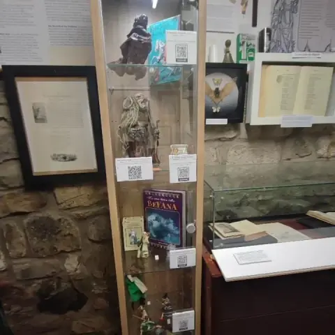 Frau Perchta  - a proud and terrifying mythical witch doll  with horns and long, beak-like nose proudly standing on a display in The Museum of Magic, Fortune-telling & Witchcraft in Edinburgh, Scotland.